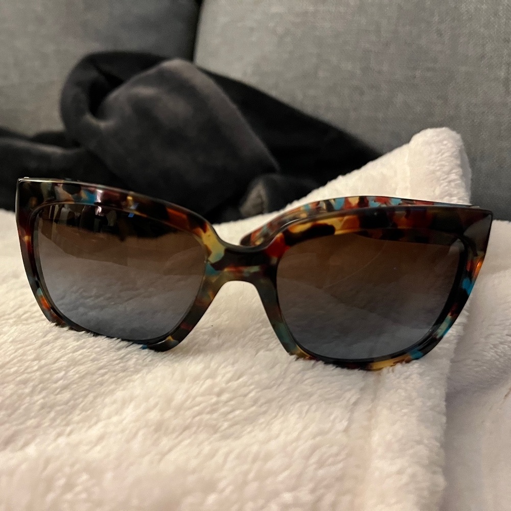 Prada tortoise with hints of blue and yellow rectangular shape sunglasses